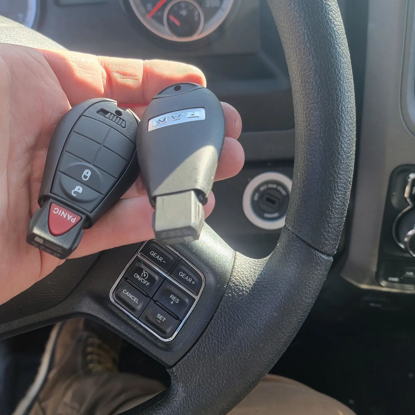 A programmed key fob in a customer's hand