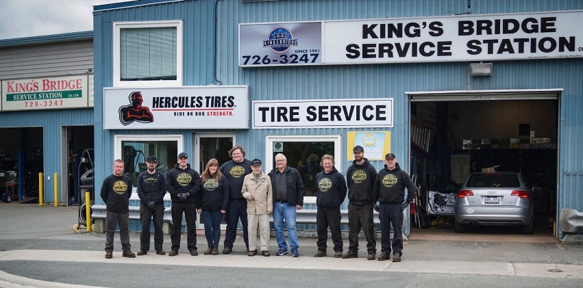 The King’s Bridge Service Station team outside the shop on Kings Bridge Road